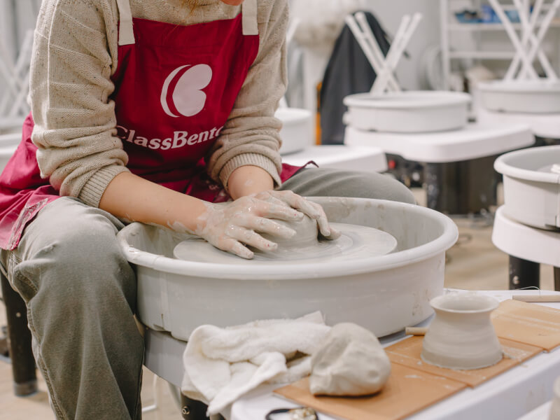 Person wheel throwing